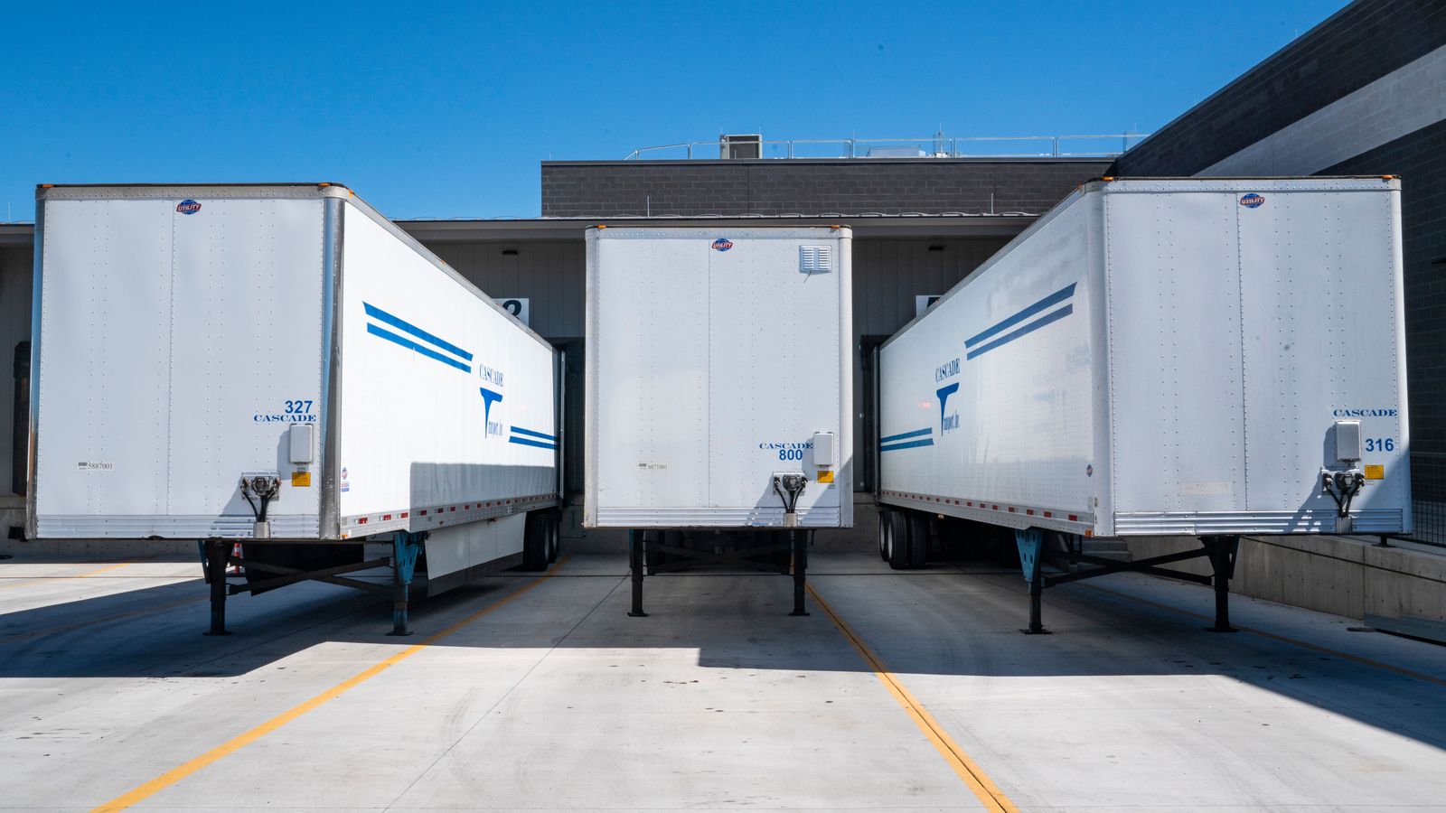 Freight trailers backed up to a loading dock