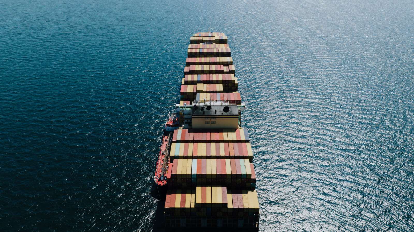 Container ship at sea from above
